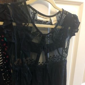 Lacy and see thru romantic top.